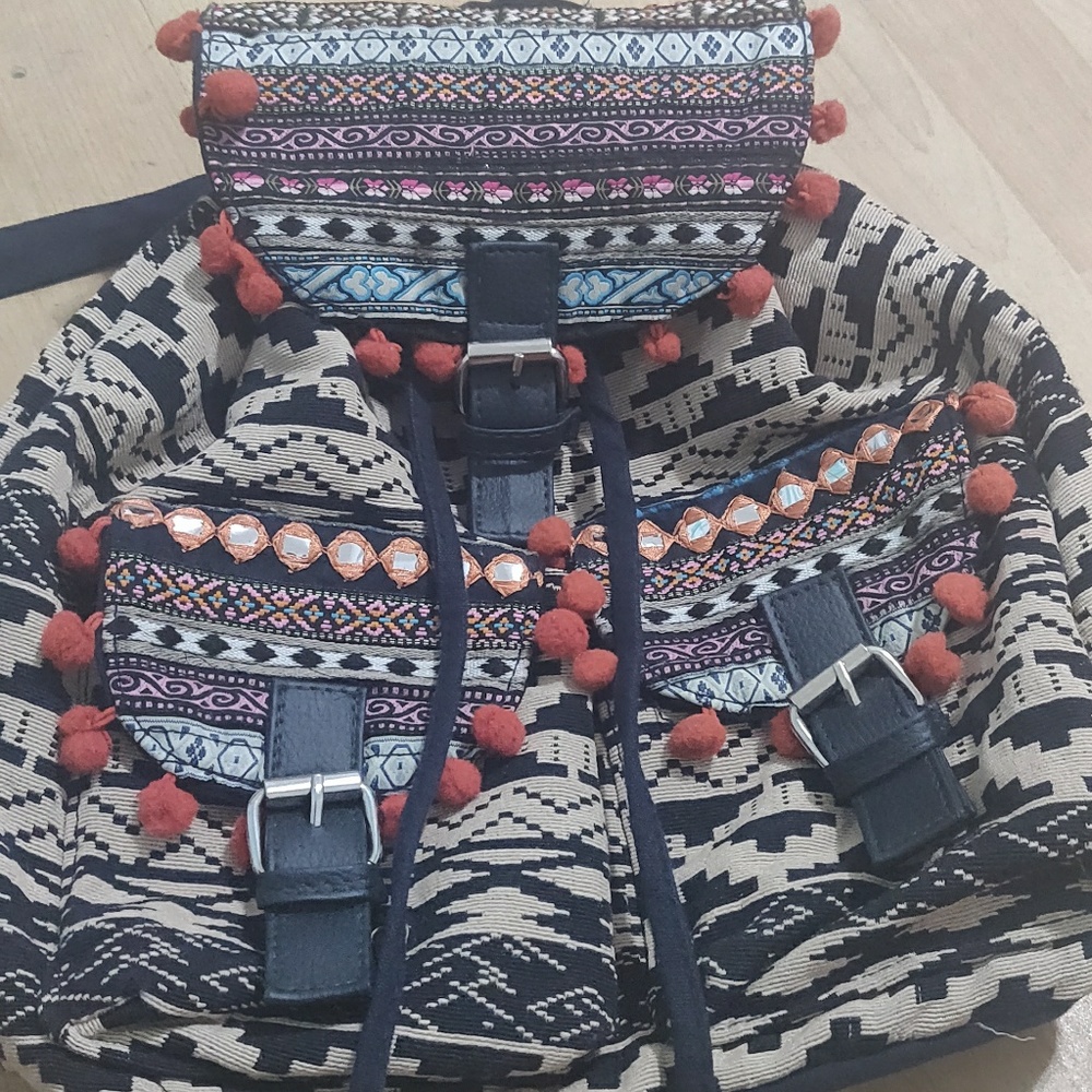 Bohemian pom pom backpack
